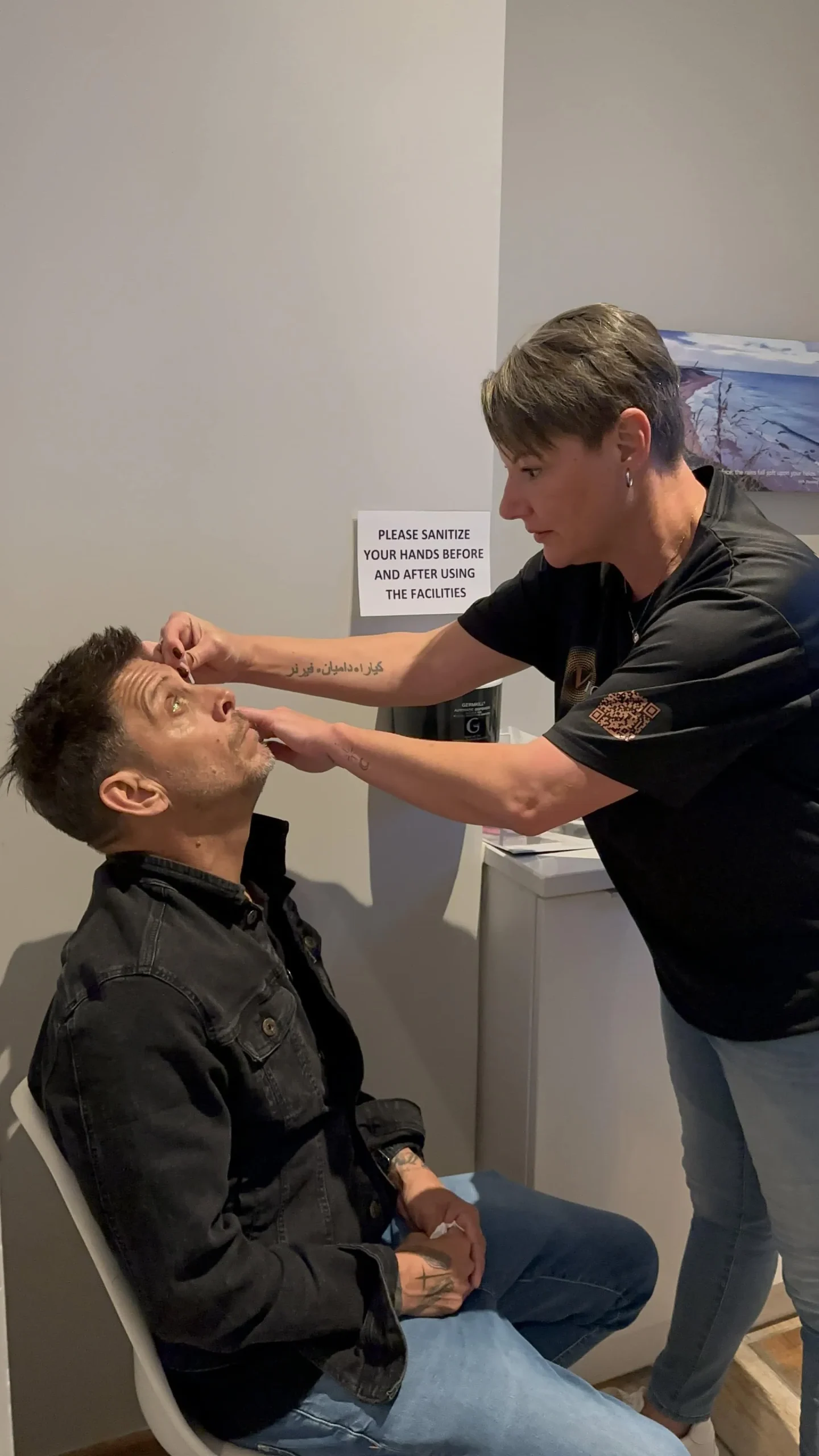 Eye drops being placed during a consultation at the clinic